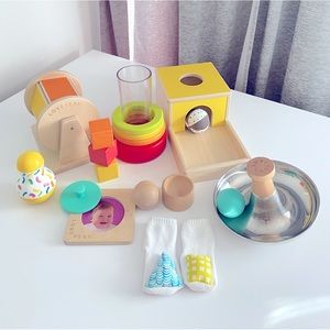 Assorted toys from LOVEVERY subscription boxes for babies 5-12 months old